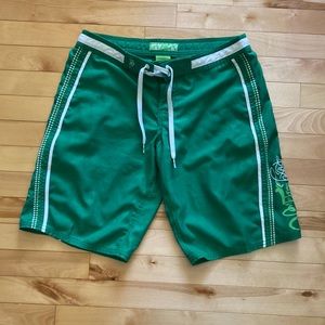 Women’s size 5 Roxy/Quicksilver surfer shorts in vibrant green colour